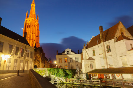 Bruges, Belgium - December 25, 2014: Quay of the Dijver. One of the most visited tourist attractions.のeditorial素材