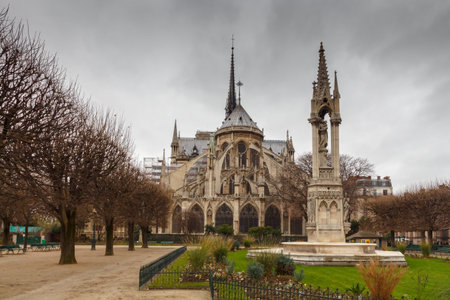 Paris, France - December 19, 2014: Notre Dame in the gloomy winter morning. Notre Dame is one of the most visited tourist attractions of Paris.のeditorial素材