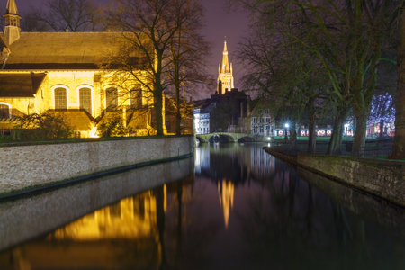 Bruges, Belgium - December 26, 2014: Old park Minnewater in Bruges. One of the favorite tourist destinations and townspeople.のeditorial素材