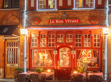 Bruges, Belgium - December 24, 2014: Decorated for Christmas cafÃ© in Bruges.のeditorial素材