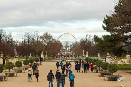 Paris, France - December 20, 2014: Tuileries Gardens, a favorite place for rest and walking tourists and townspeople.のeditorial素材