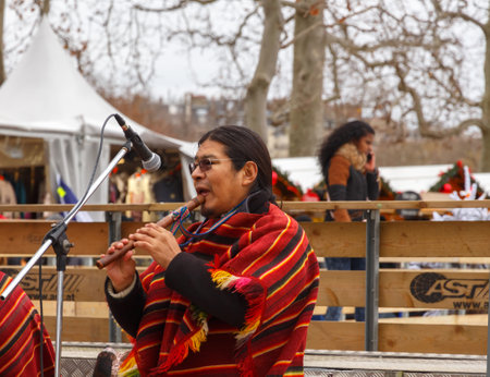 Paris, France - December 20, 2014: Street musicians entertain tourists on the Champ de Mars in Paris.のeditorial素材