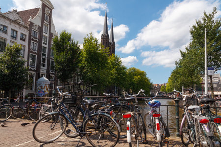Amsterdam, Netherlands - August 3, 2014: Canals of Amsterdam. Favorite place for walking and leisure travelers.のeditorial素材