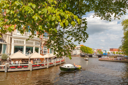 Amsterdam, Netherlands - August 3, 2014: Canals of Amsterdam. Favorite place for walking and leisure travelers.のeditorial素材