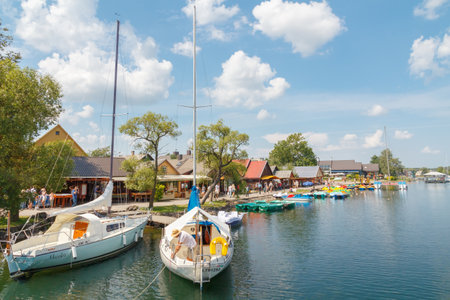 TRAKAI, LITHUANIA - July 15, 2014: Wasserhiking on the lake on the yachts in Trakai, Lithuania. Popular attractions for tourists and locals alike.のeditorial素材