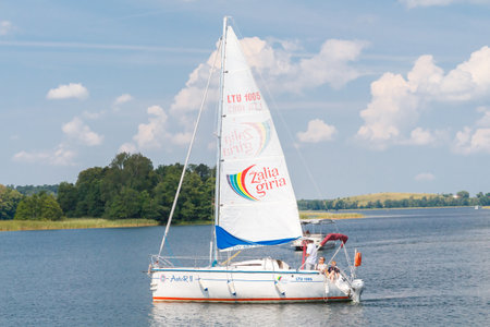 TRAKAI, LITHUANIA - July 15, 2014: Wasserhiking on the lake on the yachts in Trakai, Lithuania. Popular attractions for tourists and locals alike.のeditorial素材