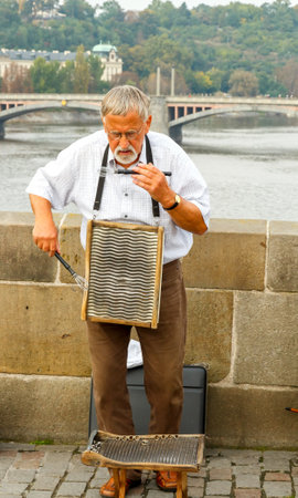 Prague, Czech Republic - October 1, 2014: presentation by of street musicians on the Charles Bridge. Charles Bridge is one of the most famous sights of the Czech capital.のeditorial素材