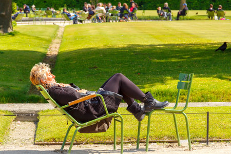 Paris, France - May 3, 2014: Tuileries Garden favorite place for walking and recreation tourists and residents. Located between the Louvre and the Place de la Concorde.のeditorial素材