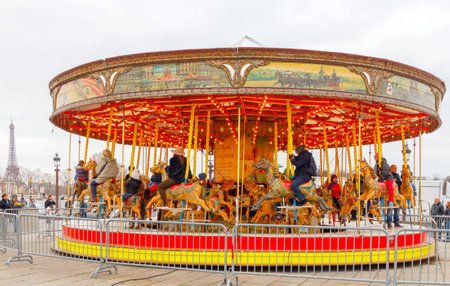 Paris France  December 21 2014: Traditional French carousel at the Place de la Concorde in Paris.のeditorial素材