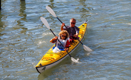 Venice Italy May 24 2015: Racing rowing in the Venetian lagoon. The annual Vogalonga Regatta. In the race was attended by about 1500 boats from around the world.のeditorial素材