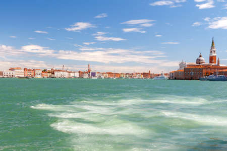 Embankment near the Doge's Palace and campanile cathedral of San Marco with the Venetian lagoon.の写真素材