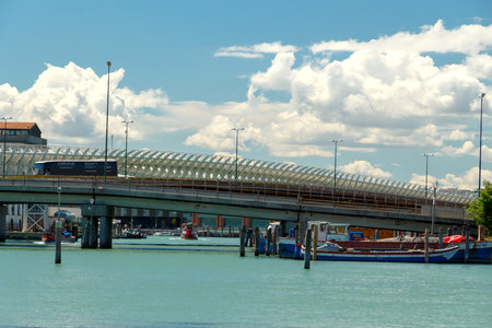 Venice, Italy - May 24, 2015: Monorail through the canal linking the city with the port.のeditorial素材