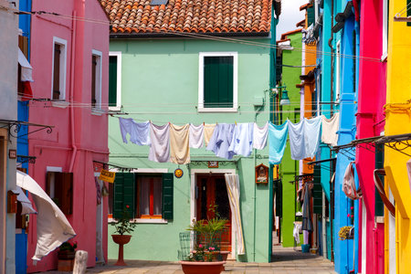 Venice, Italy - May 21, 2015: The island in the lagoon near Venice. Famous tourist attraction. Famous for its colorful houses and lace.のeditorial素材