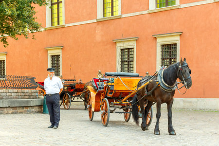Warsaw, Poland - July 25, 2015: Walking through the streets of Warsaw in a carriage. A popular tourist attraction.のeditorial素材