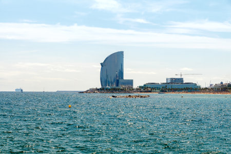 Barcelona, Spain - September 5, 2015: Barceloneta is one of the most popular city beaches of Barcelona. Many tourists come here to sunbathe, swim and play sports.のeditorial素材