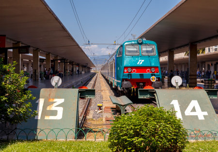 Florence, Italy - May 18, 2015: The platform at the railway station of Florence Santa Maria Novella in Italy. Florence is a major railway junction.のeditorial素材