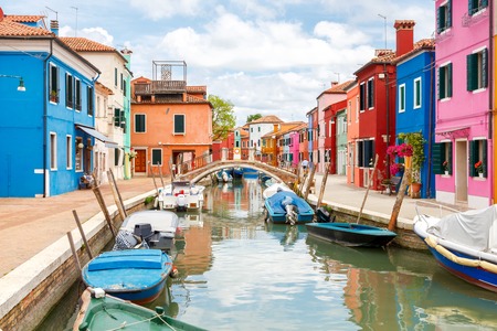 The island in the lagoon near Venice. Famous tourist attraction. Famous for its colorful houses and lace. The island in the lagoon near Venice. Famous tourist attraction. Famous for its colorful houses and lace.