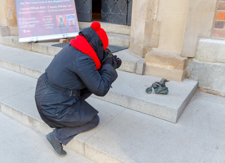 Wroclaw, Poland - December 31, 2015: Small bronze sculptures of gnomes. More than 250 figures are set on the streets of Wroclaw and is a symbol of the city.のeditorial素材