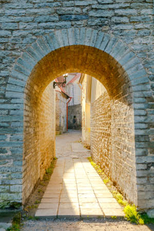 Medieval fortifications made of stone in the old Tallinn.の写真素材