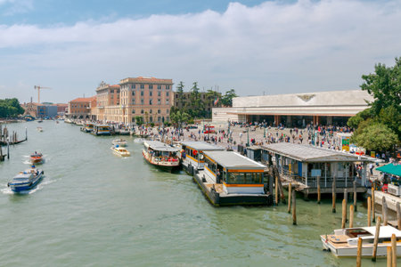 Venice, Italy - 25 May, 2015: The Central railway station of Santa Lucia and the pier for the vaporetto on the Grand Canal in Venice. Water transport is the most popular means of transportation in the city.のeditorial素材