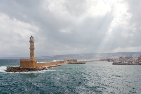 Old lighthouse in Chania in stormy weather.の写真素材