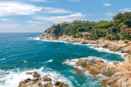 View of the rocky coast of the Costa Brava near Tossa de Mar resort.の写真素材