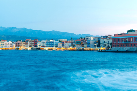 Night view of the quay with lanterns and the old harbor in Chania. Greece.の写真素材