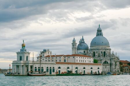 View of the Basilica of Santa Maria della Salute with Venetian lagoon.の写真素材