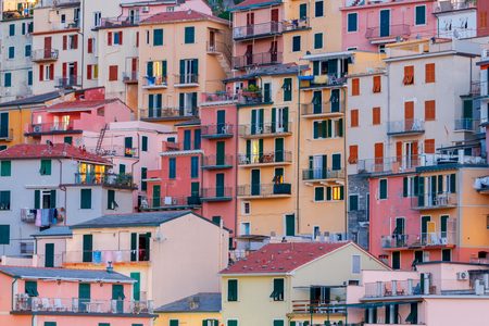 A view of the colorful traditional houses on the rock. The coast of Liguria. Manarola, Cinque Terre.の写真素材