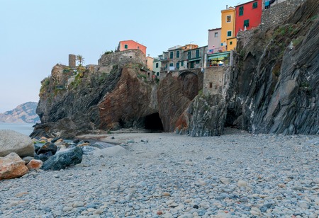Municipal pebble beach in the old village of Vernazza. Parco Nazionale delle Cinque Terre, Liguria, Italy.の写真素材