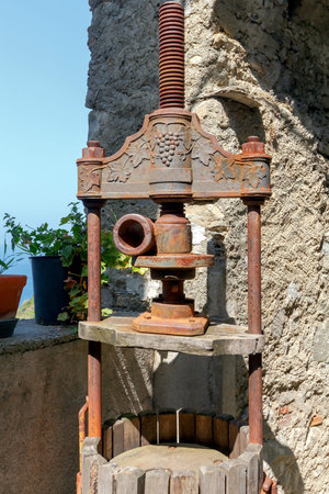 Traditional press for making wine from the grapes in Liguria. Italy.