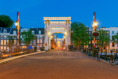 The Skinny Bridge (Magere Brug) at night. Amsterdam. Netherlands.の写真素材