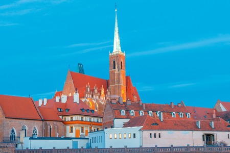 View of the Cathedral of St. John the Baptist on the island Tumski in Wroclaw on the sunset. Poland.の写真素材