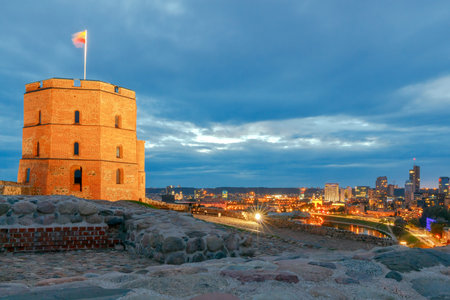 Scenic view from the top of Gediminas Hill to the center of Vilnius and Neris river at night.の写真素材