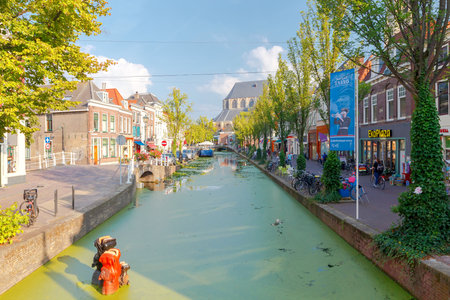 Delft, The Netherlands - August 30, 2016: The original composition of horses drowning in the urban canal. One of the city's attractions.のeditorial素材