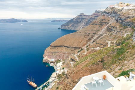 View of the caldera, the old harbor and the road to it in Fira. Santorini.の写真素材