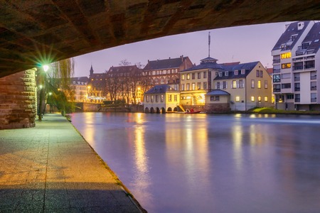 Half-timbered house on the canal at night in Strasbourg. Alsace.の写真素材
