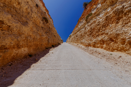 Malta. The road between rocks.の写真素材
