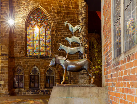 Bremen, Germany - March 31, 2017: Statue of the Bremen musicians, donkey, dog, cat and rooster in the historic center of the Old Town.のeditorial素材