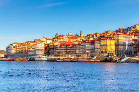Porto. Multicolored houses on the waterfront of the Douro River.の写真素材