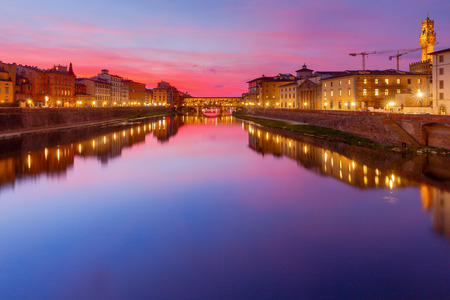 The old medieval bridge Ponte Vecchio at sunset. Florence. Italy.の写真素材