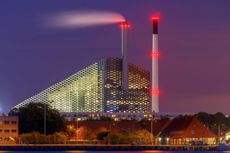 Copenhagen, Sweden - August 18, 2018: View of the city power plant at sunset. Copenhagen. Denmark.のeditorial素材