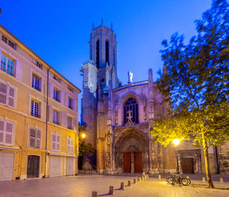 View of the facade of the old Catholic cathedral in the night lighting. France. Provence. Aix-en-Provence.の写真素材