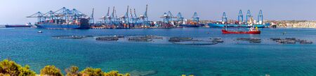 Panoramic view of cargo pore vessels and container terminal. Marsaxlokk. Malta.の写真素材