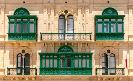 Valletta. Traditional balconies on the facades of houses.の写真素材