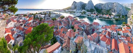 Panoramic views of the city, mountains and coast at sunset. Omis. Croatia.の写真素材