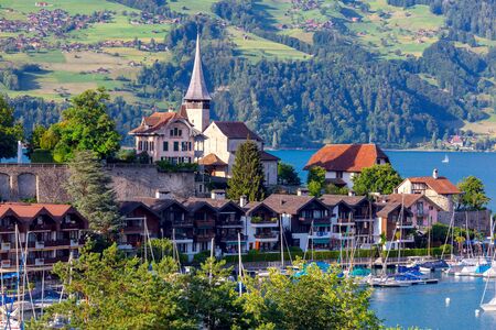 The traditional alpine village Spiez near Lake Thun.の写真素材