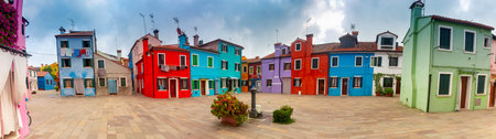 Panorama. Facades of traditional old houses on the island of Burano.