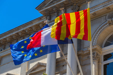 Avignon. National flags at city hall.