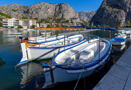 Boats in the fishing harbor at the mouth of the river. Omis. Croatia.
